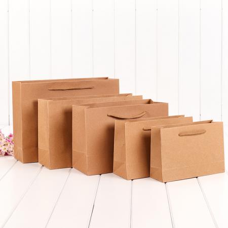 China Supplier Logo Printed Colorful Kraft Paper Shopping Bag With Handle