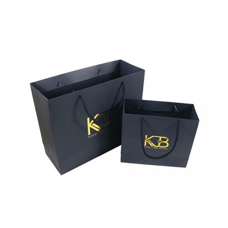 New Gold Logo Hot Foiled Stamping Black Matt Kraft Paper Bag With Cotton Rope Handles