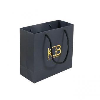 New Gold Logo Hot Foiled Stamping Black Matt Kraft Paper Bag With Cotton Rope Handles