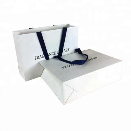 China well made customized ribbon handle stand up white paper bag with logo printing