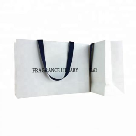 China well made customized ribbon handle stand up white paper bag with logo printing