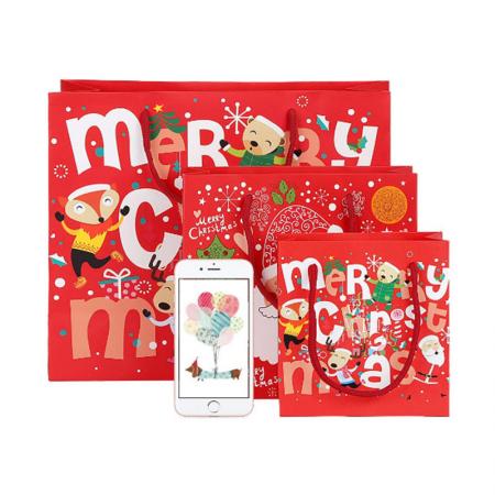 Fancy good quality Merry christmas gift bag holiday promotional colorful Christmas paper bag with handles